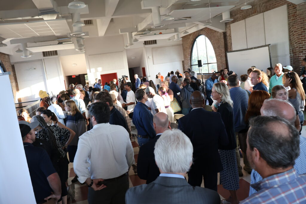 People in crowded room